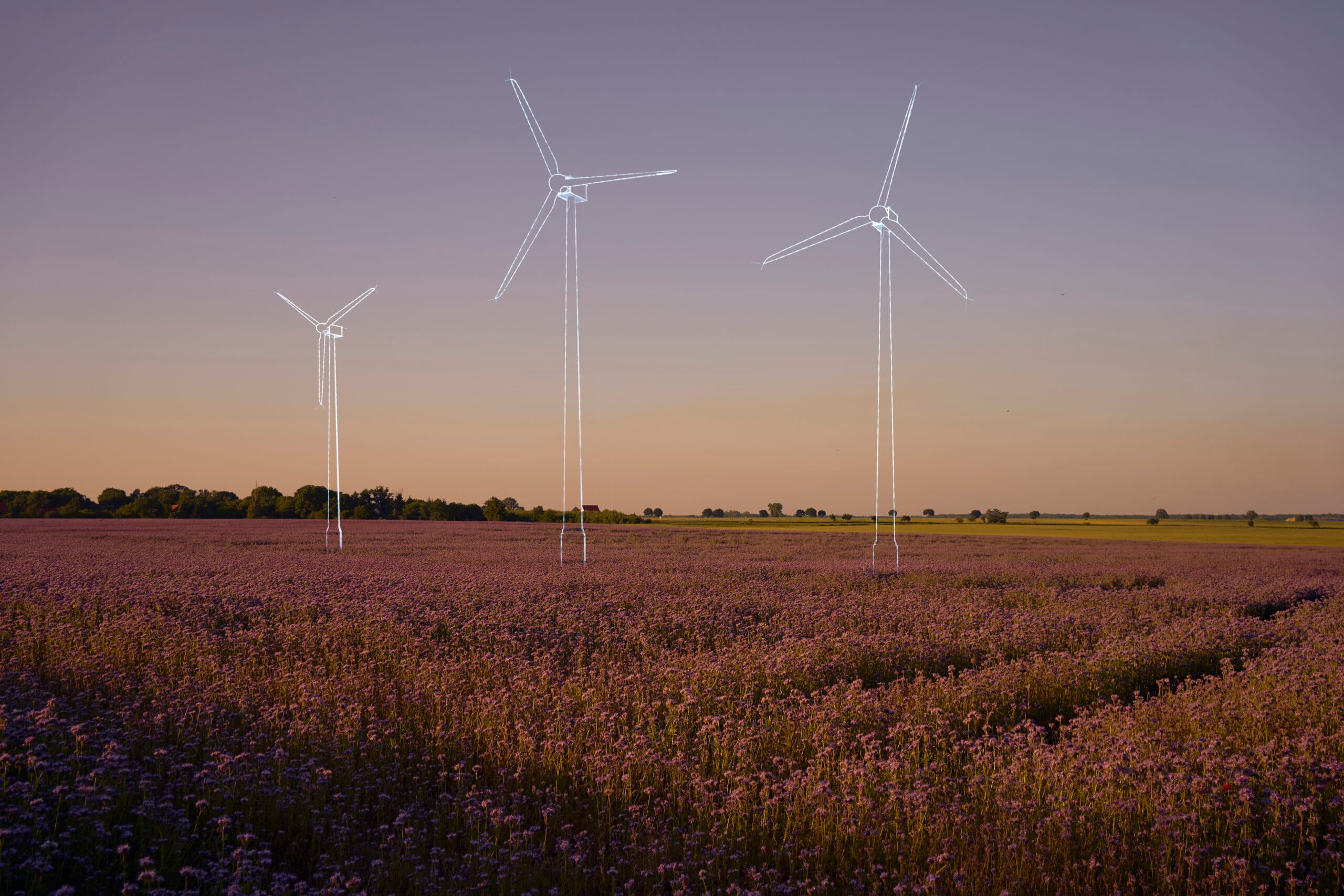 Digital generated image of hand drawn wind turbines overlaid over flower field on sunset. ...