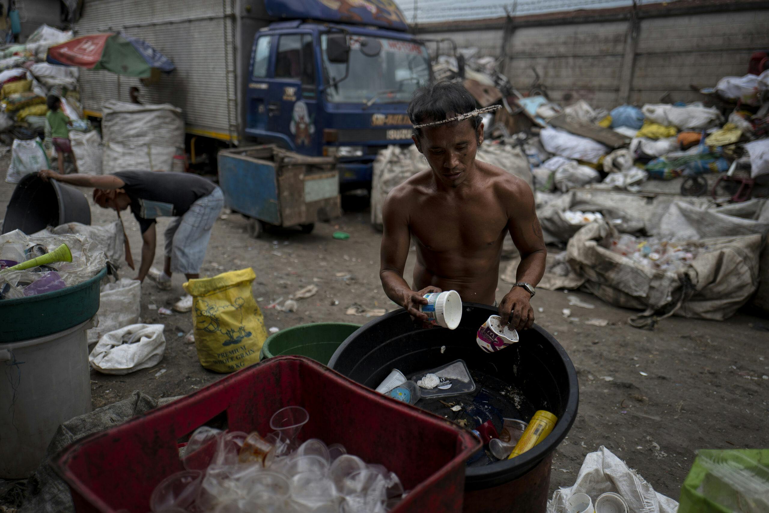 MANILA, PHILIPPINES - APRIL 18: Residents of Happy Land village collects and recycle plastic wastes as a means of living on April 18, 2018 in Manila, Philippines. The Philippines has been ranked third on the list of the world's top-five plastic polluter into the ocean, after China and Indonesia, while reports show that almost half of the global plastic garbage come from developing countries, including Vietnam and Thailand. Sunday marks the 48th iteration of Earth Day, an annual event marked across the world to show support for environmental protection, as organizations aim to dedicate this year's theme towards ending plastic pollution and change people's attitudes and behavior about plastic consumption and the impact it has on the environment. Over a million people have reportedly signed petitions around the world, demanding for corporations to reduce the production of single-use plastics which affects rapidly developing countries as most disposable packaging like food-wrapping, sachets, and shopping bags land up on the coastlines after being discarded. Most of these countries lack the infrastructure to effectively manage their waste and those who live on lower incomes usually rely on cheap products which are sold in single-use sachets such as instant coffee, shampoo, and food seasoning. According to studies, there could be more plastic in the sea than fish by 2050 while actual plastic bits might be in our seafood as fishes consume bits of plastic which are coated in bacteria and algae, mimicking their natural food sources, and eventually lands on our dinner table. (Photo by Jes Aznar/Getty Images)